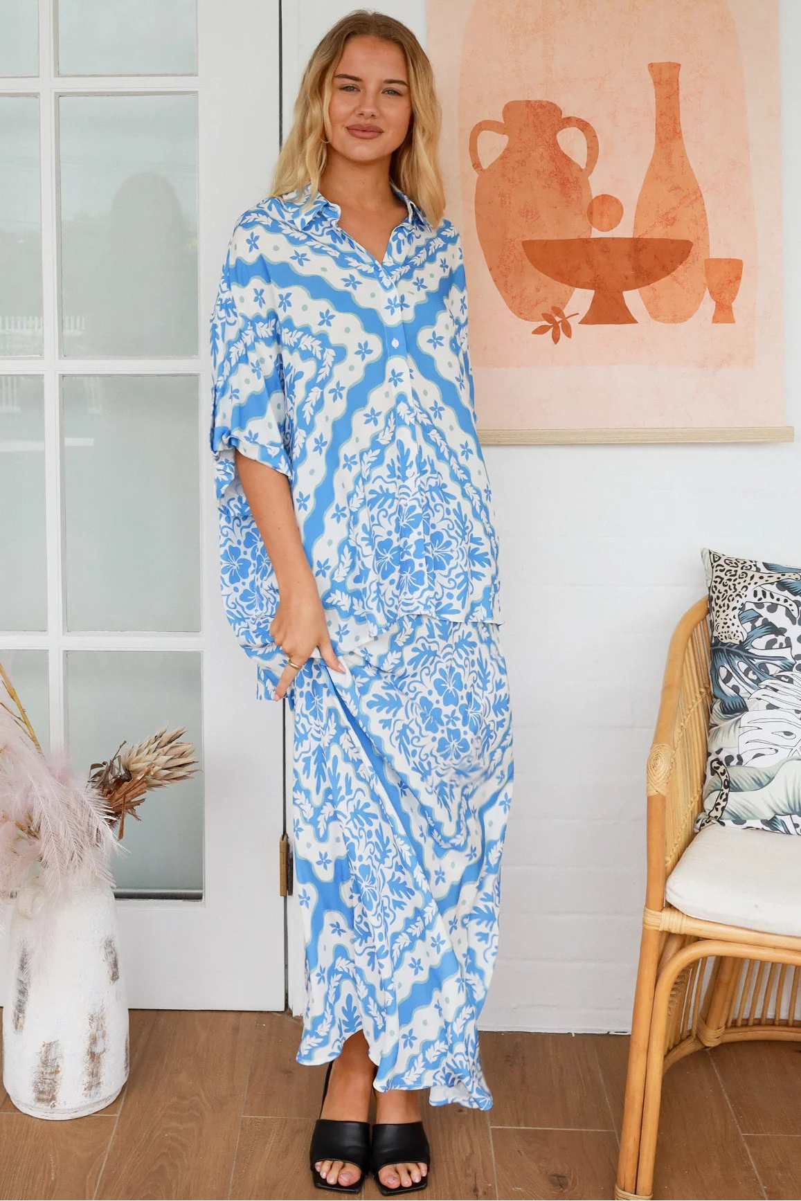 Dreamcatcher Emmy oversized blue floral rayon shirt with button front back yoke pleats and roll-tab sleeve detail