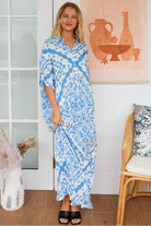 Dreamcatcher Emmy oversized blue floral rayon shirt with button front back yoke pleats and roll-tab sleeve detail