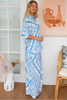 Dreamcatcher Emmy oversized blue floral rayon shirt with button front back yoke pleats and roll-tab sleeve detail