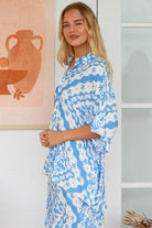 Dreamcatcher Emmy oversized blue floral rayon shirt with button front back yoke pleats and roll-tab sleeve detail