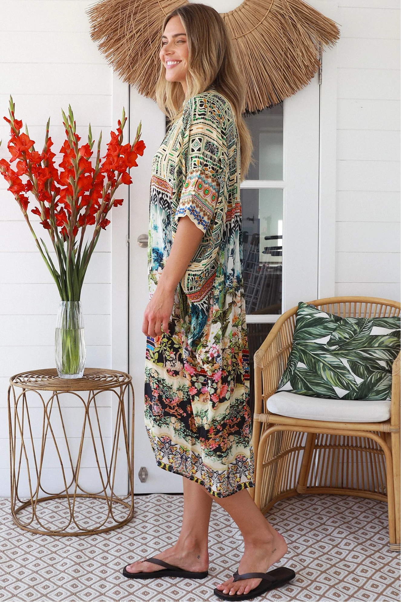 Woman wearing Oasis Kaftan Midi Dress in neutral geometric print with mosaic sleeve trim and petite collar – Peacock Feather Resort Collection