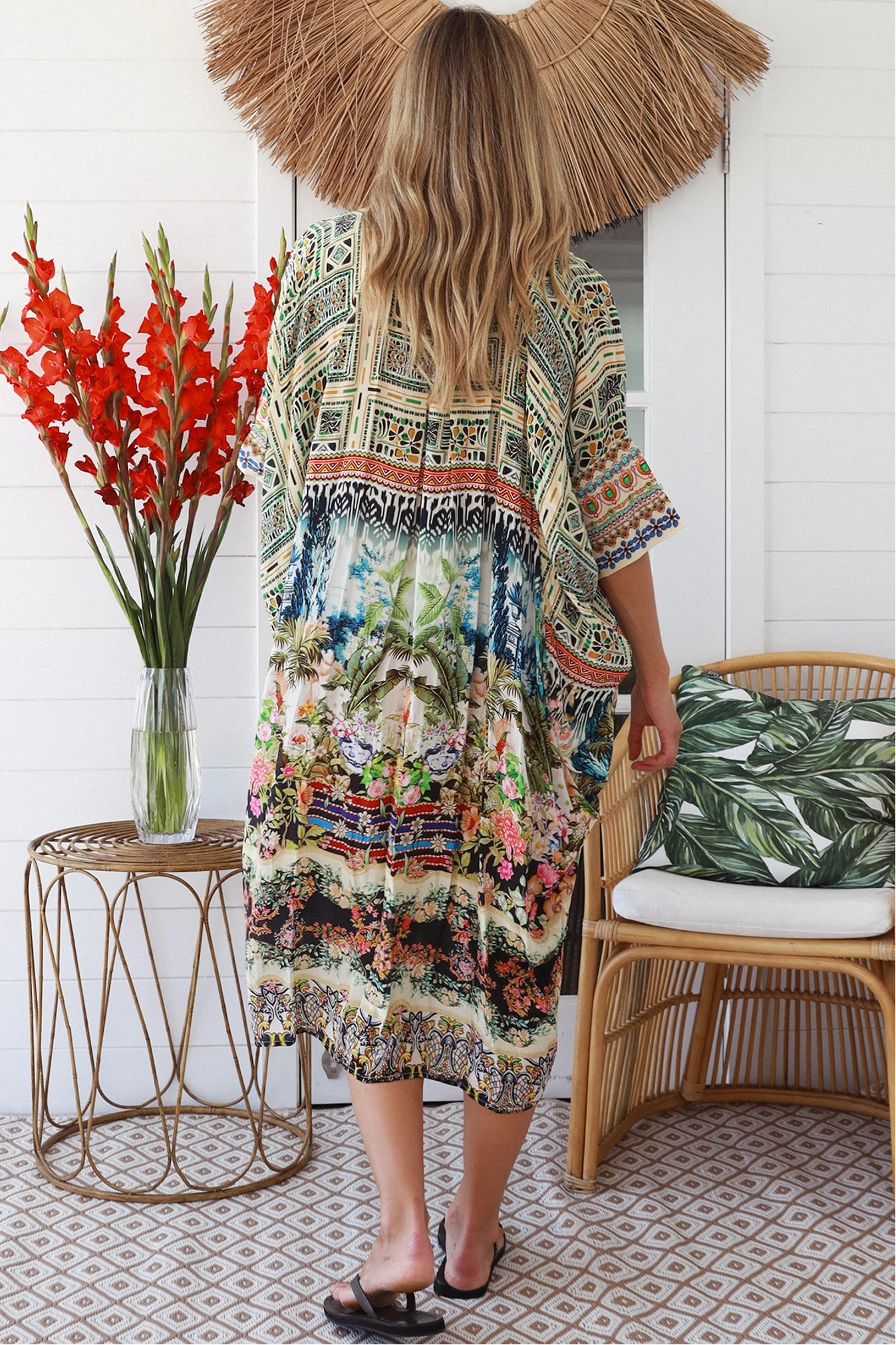 Woman wearing Oasis Kaftan Midi Dress in neutral geometric print with mosaic sleeve trim and petite collar – Peacock Feather Resort Collection