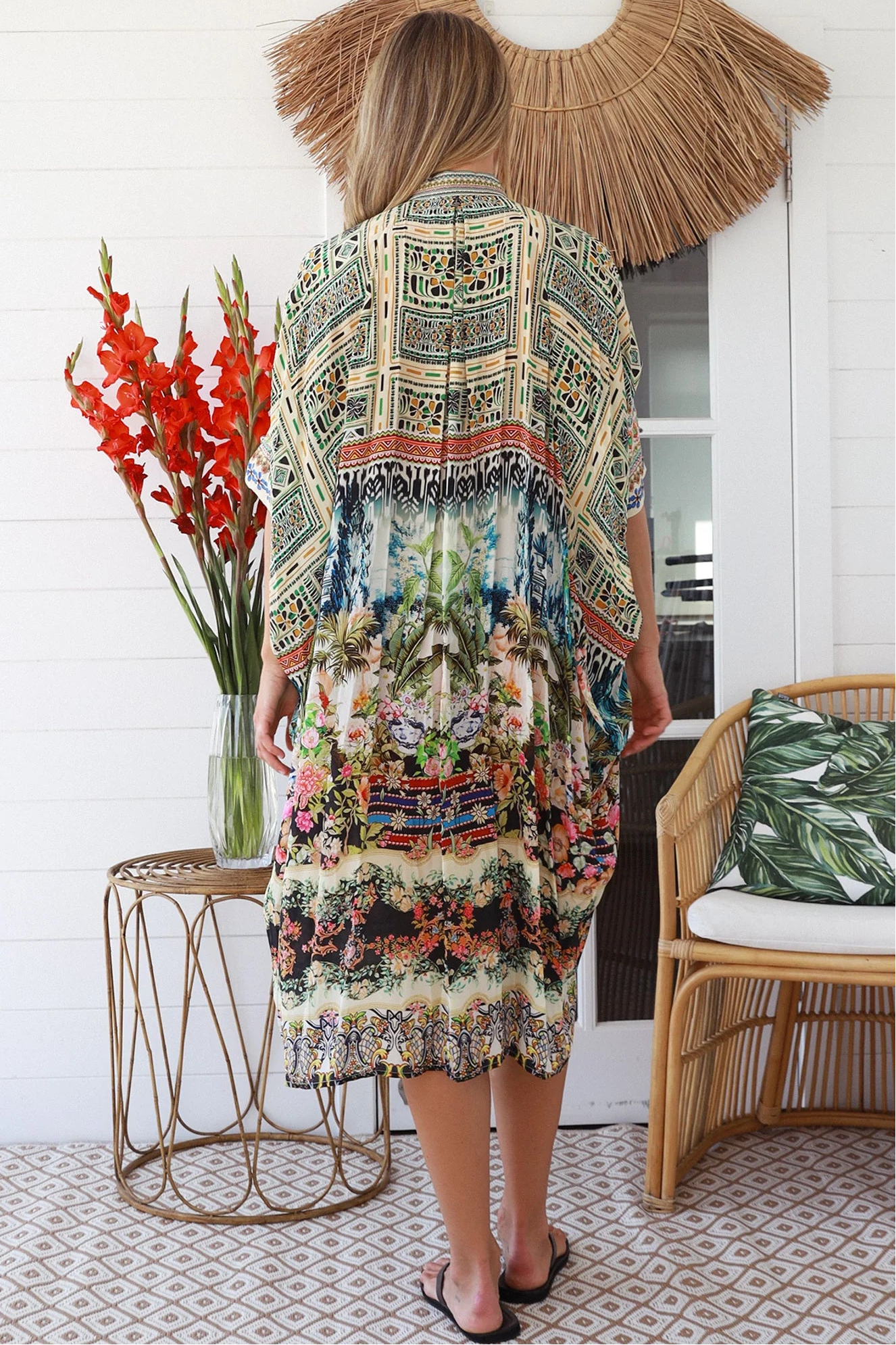 Woman wearing Oasis Kaftan Midi Dress in neutral geometric print with mosaic sleeve trim and petite collar – Peacock Feather Resort Collection
