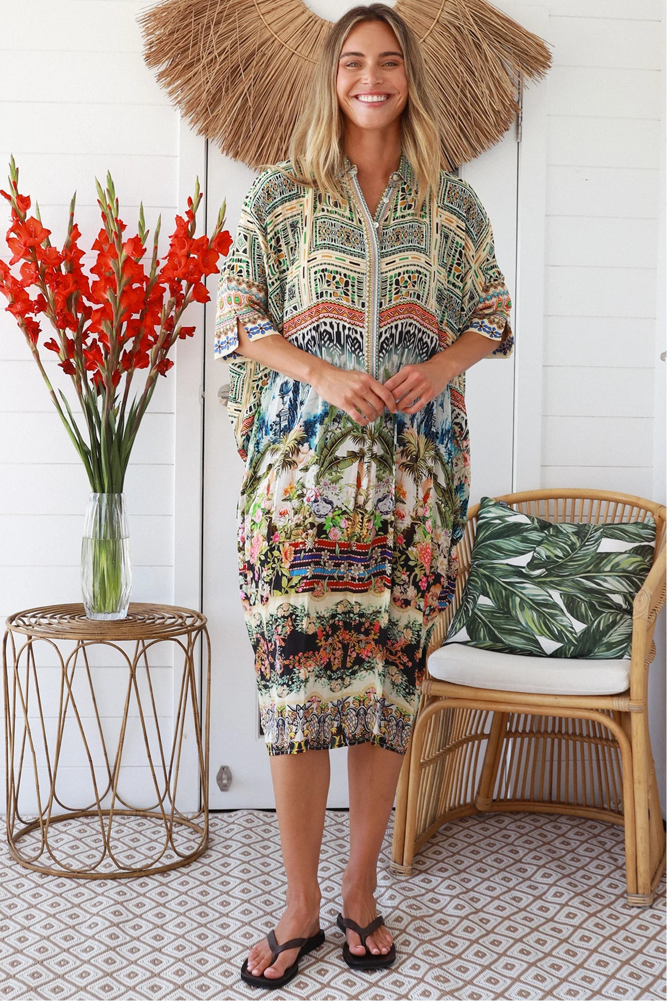 Woman wearing Oasis Kaftan Midi Dress in neutral geometric print with mosaic sleeve trim and petite collar – Peacock Feather Resort Collection