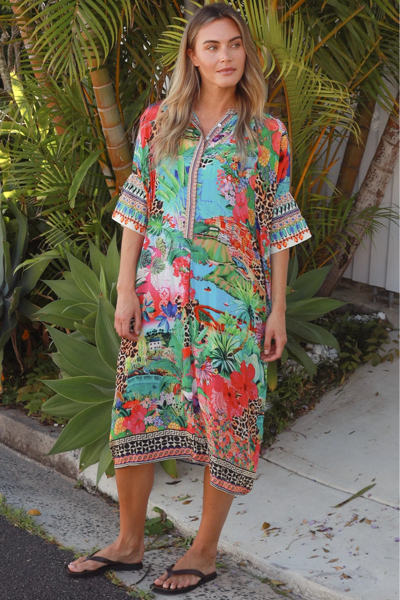 Wearing tropical viscose linen midi dress with flared sleeves and border print - Bohemian Love Runway 