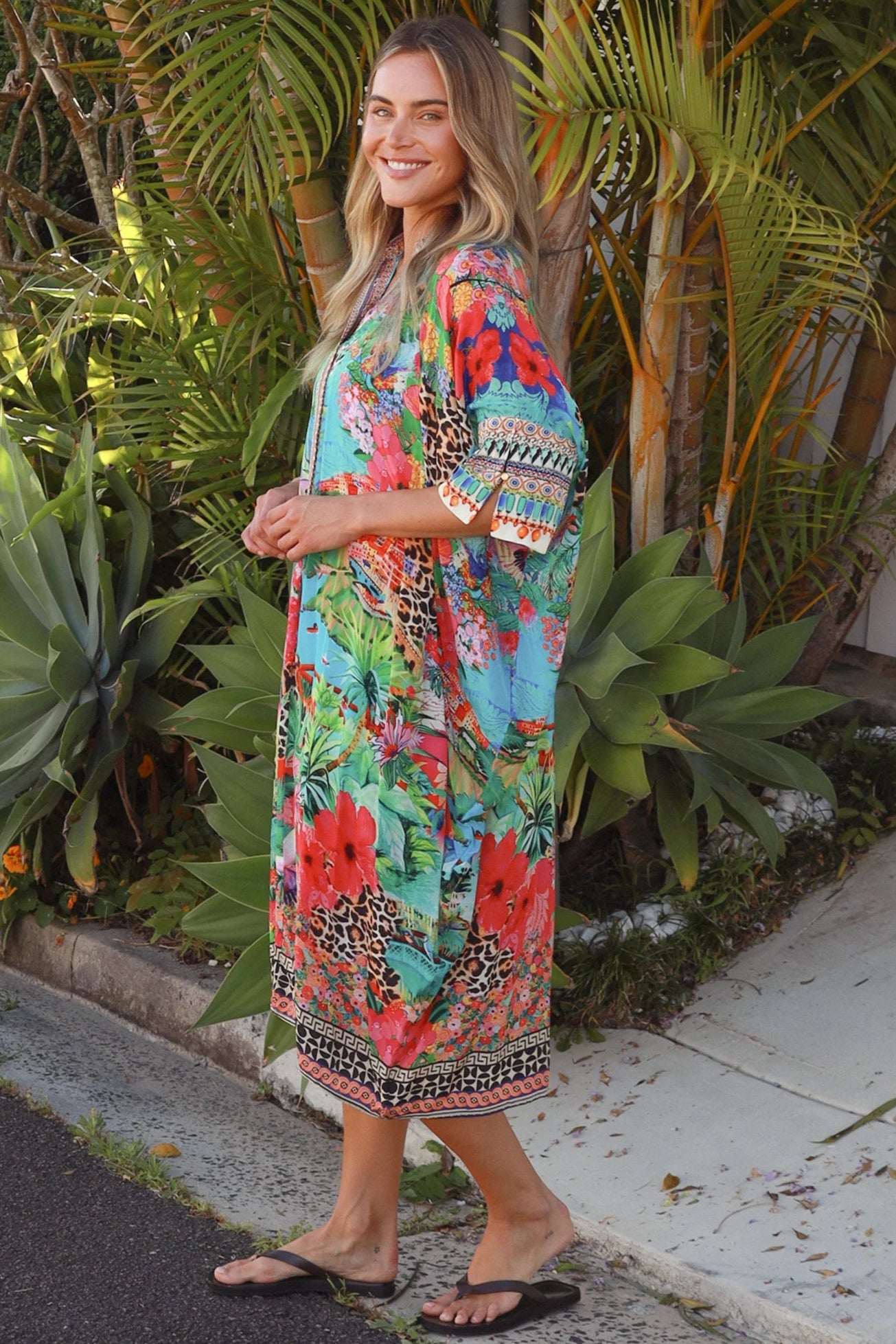 Wearing tropical viscose linen midi dress with flared sleeves and border print - Bohemian Love Runway 