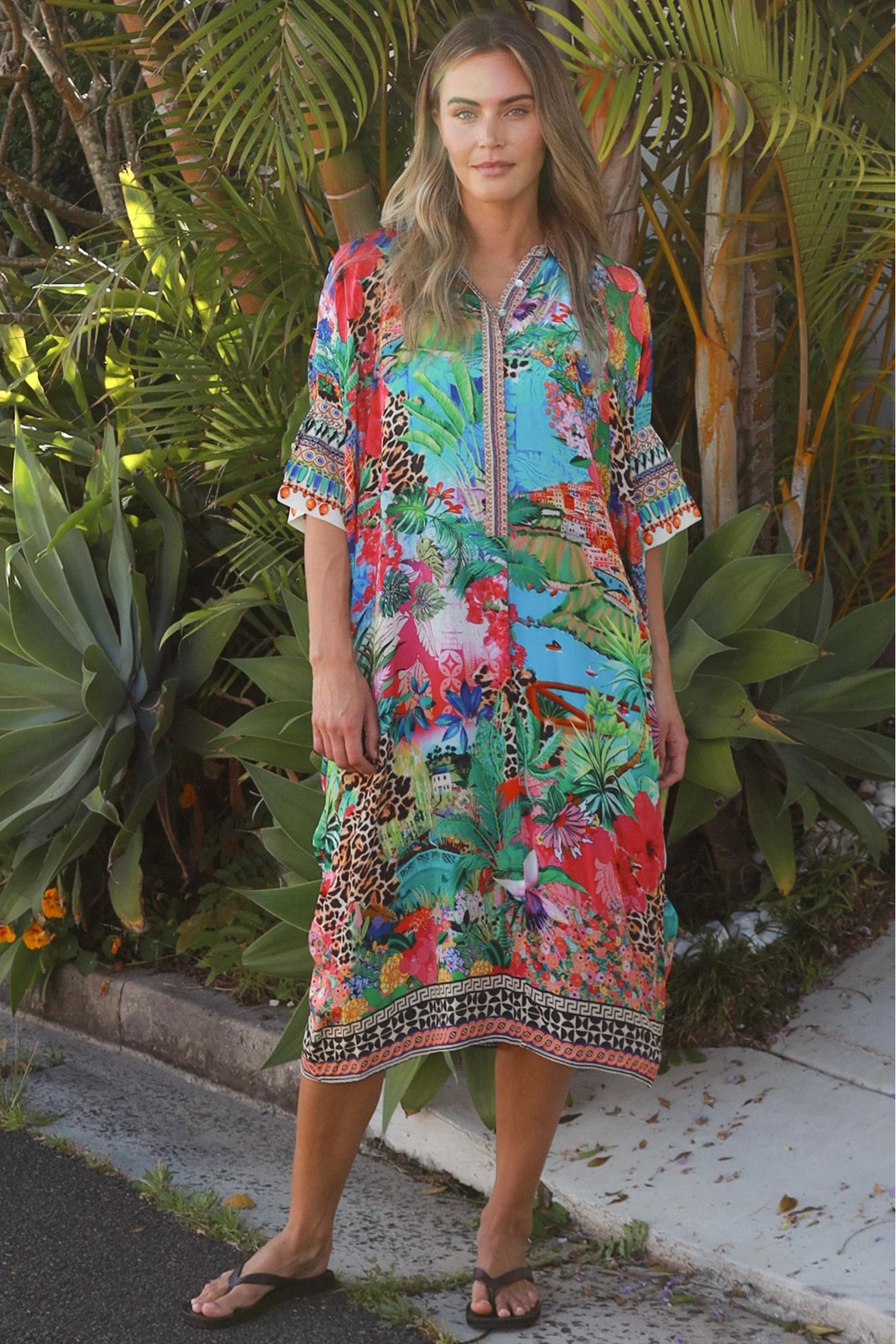 Wearing tropical viscose linen midi dress with flared sleeves and border print - Bohemian Love Runway 
