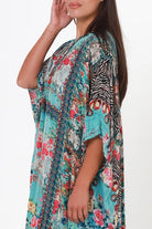 Mirage Floral Kaftan Turquoise Bloom by Peacock Feather the Label in viscose crepe with botanical boho print