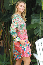 “Woman in mint, coral and turquoise patchwork viscose crepe boho shirt mini dress by Peacock Feather – The Journey Shirt Mini Dress”