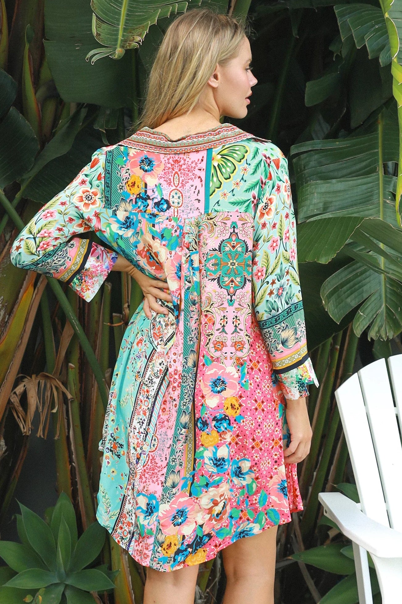 “Woman in mint, coral and turquoise patchwork viscose crepe boho shirt mini dress by Peacock Feather – The Journey Shirt Mini Dress”