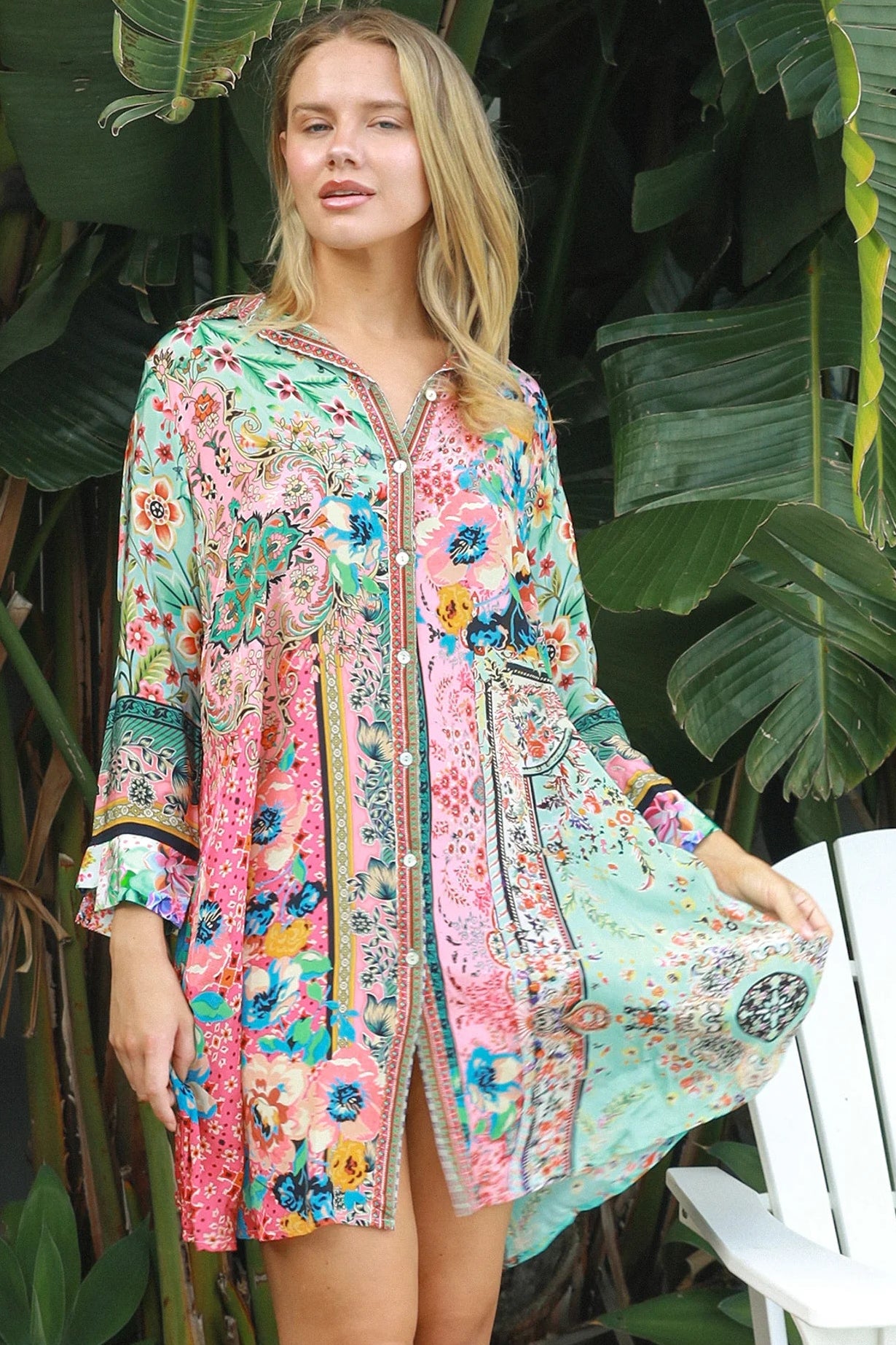 “Woman in mint, coral and turquoise patchwork viscose crepe boho shirt mini dress by Peacock Feather – The Journey Shirt Mini Dress”