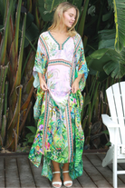 Viscose crepe tropical print one-size kaftan with beaded detailing – Peacock Feather Resort Luxe white background