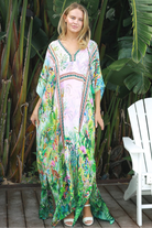 Viscose crepe tropical print one-size kaftan with beaded detailing – Peacock Feather Resort Luxe white background