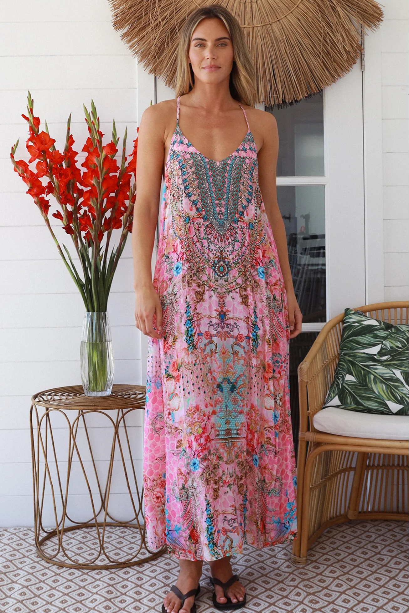 Woman in rose pink floral resort luxe midi dress with racerback straps - boho summer style Australia