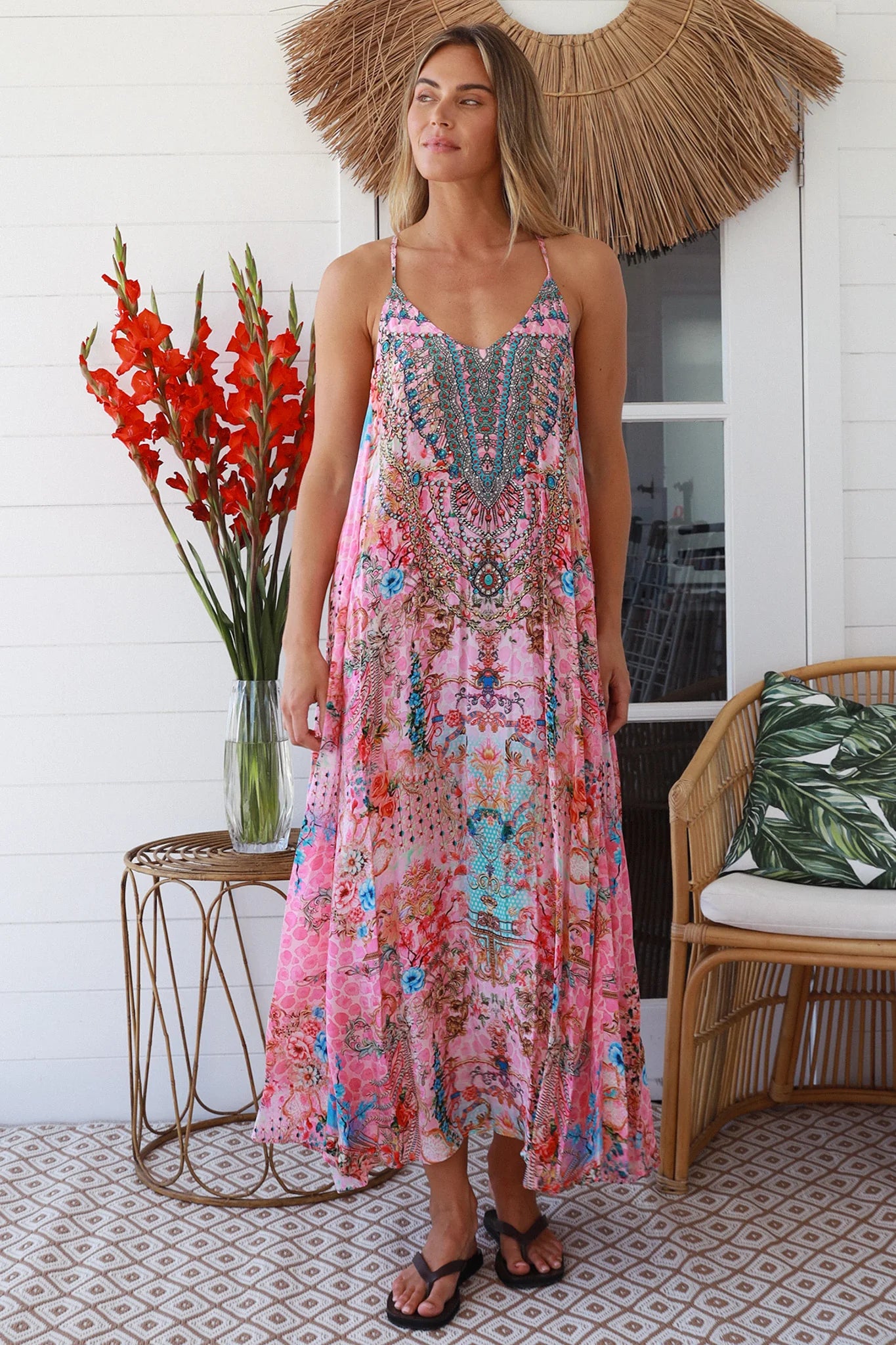 Woman in rose pink floral resort luxe midi dress with racerback straps - boho summer style Australia