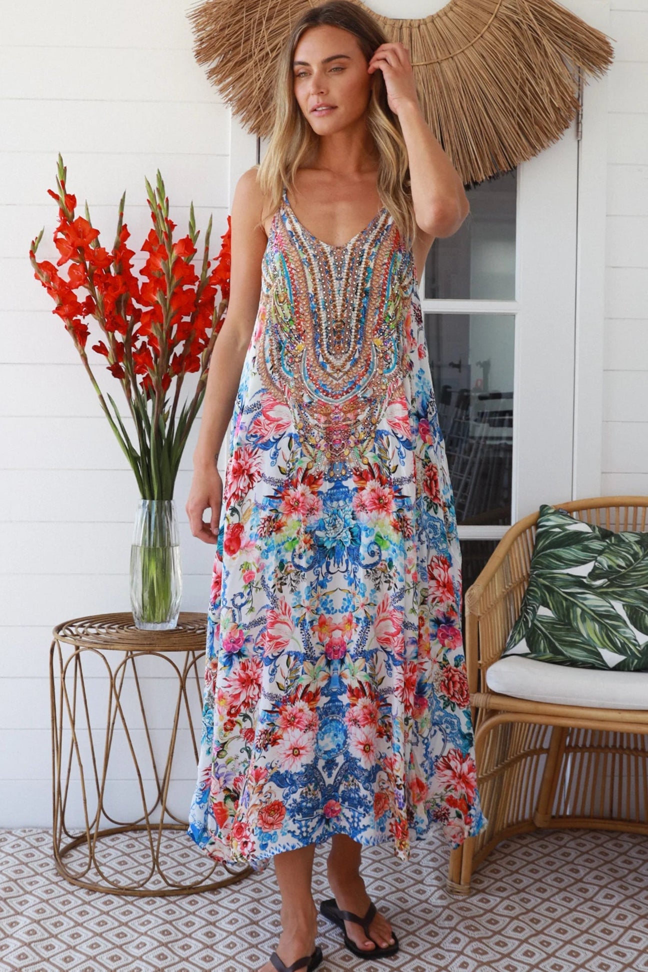 Woman in white boho midi dress with blue and coral floral mosaic print, racer back and adjustable straps - Australian boho fashion