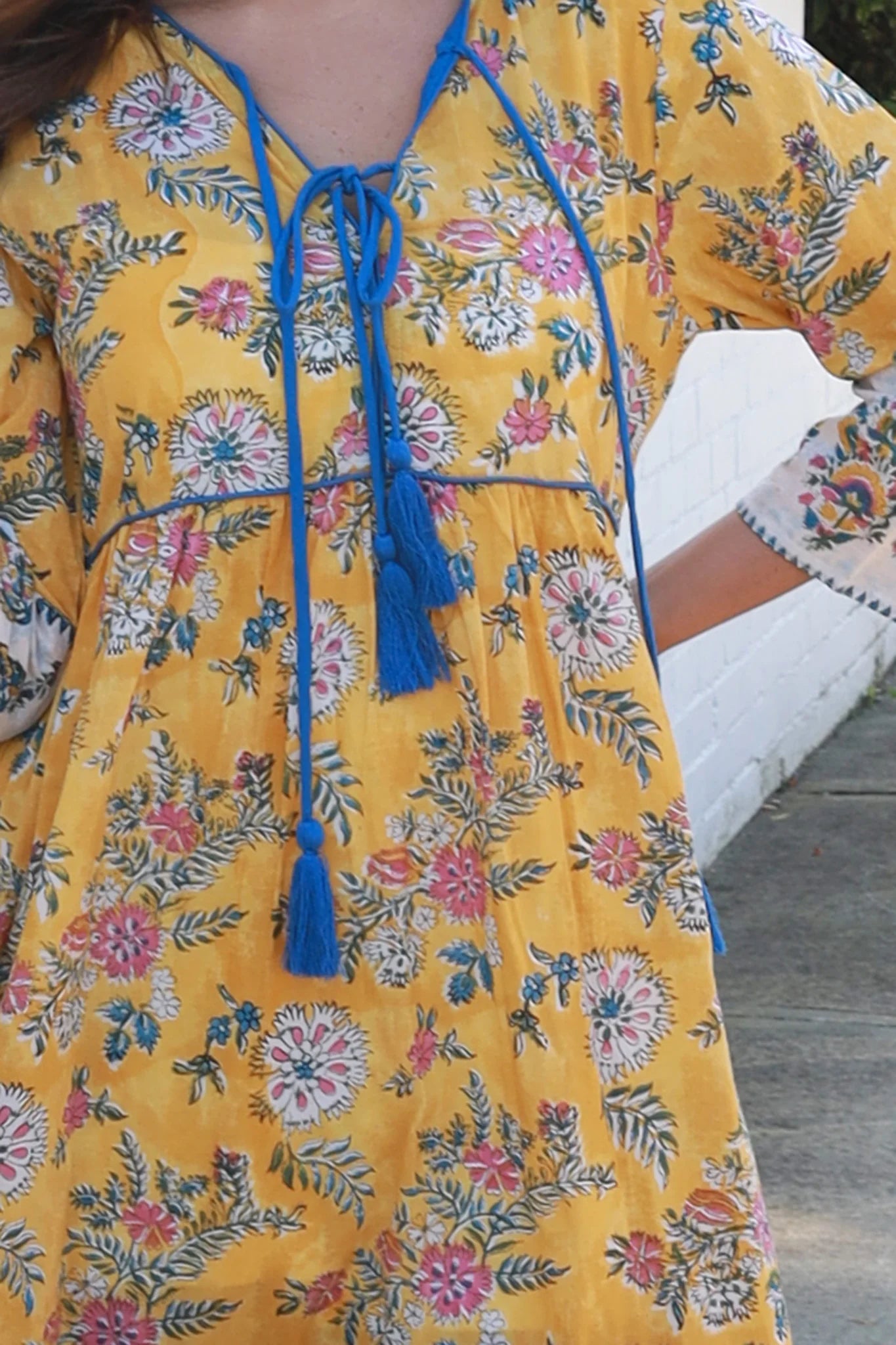 Golden Dahlia cotton boho mini dress wit floral border print blue piping and tassel ties - Australia