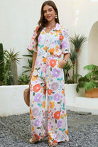 Vintage floral wide-leg pants with elastic waist and soft pastel print in a relaxed boho silhouette