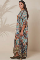 Mirage Kaftan Vintage Mint bohemian viscose crepe kaftan with botanical print, birds, rhinestones and tassel ties