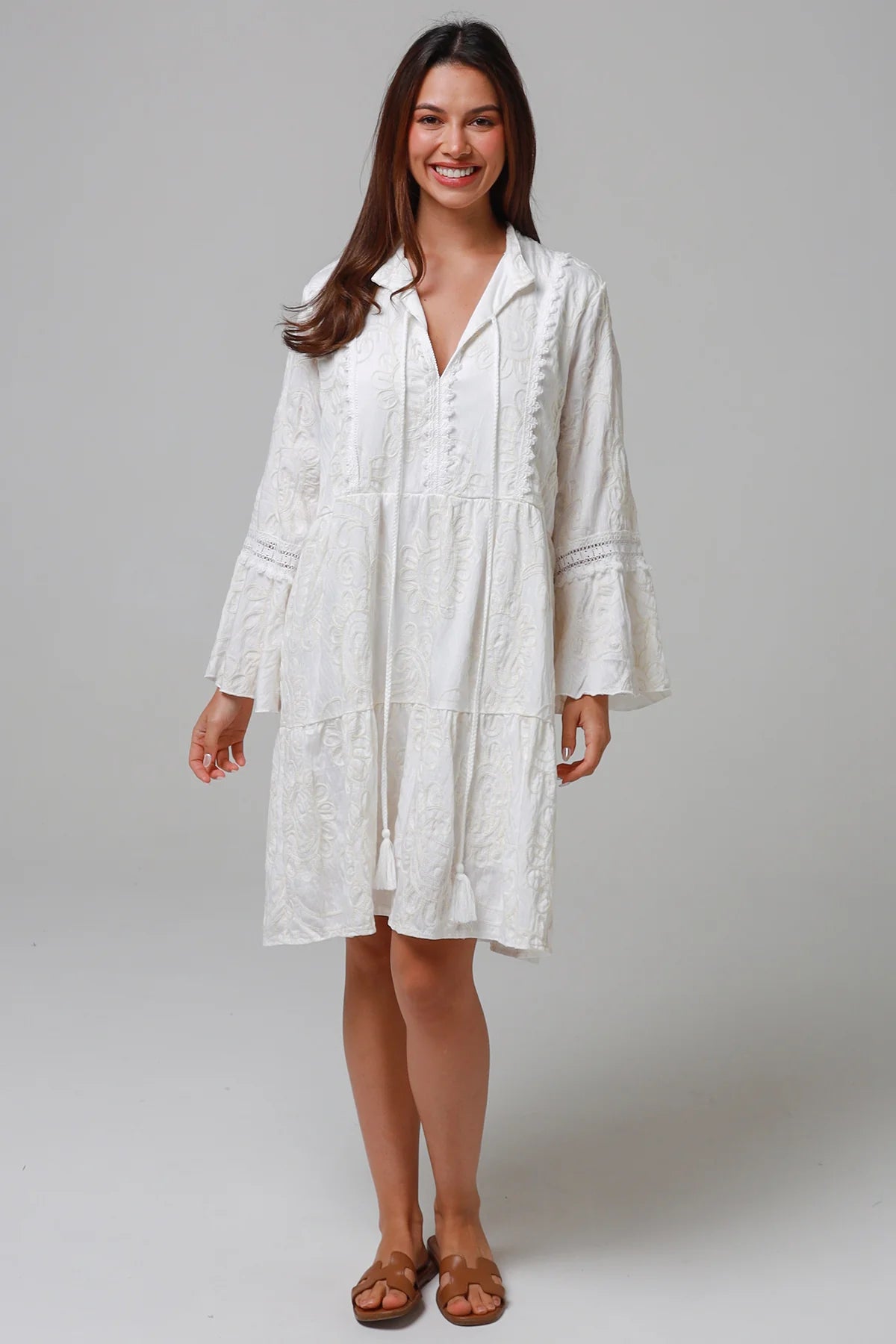 White embroidered cotton boho mini dress with lace sleeves and tassel ties - Bohemian Love Runway Australia Boho.