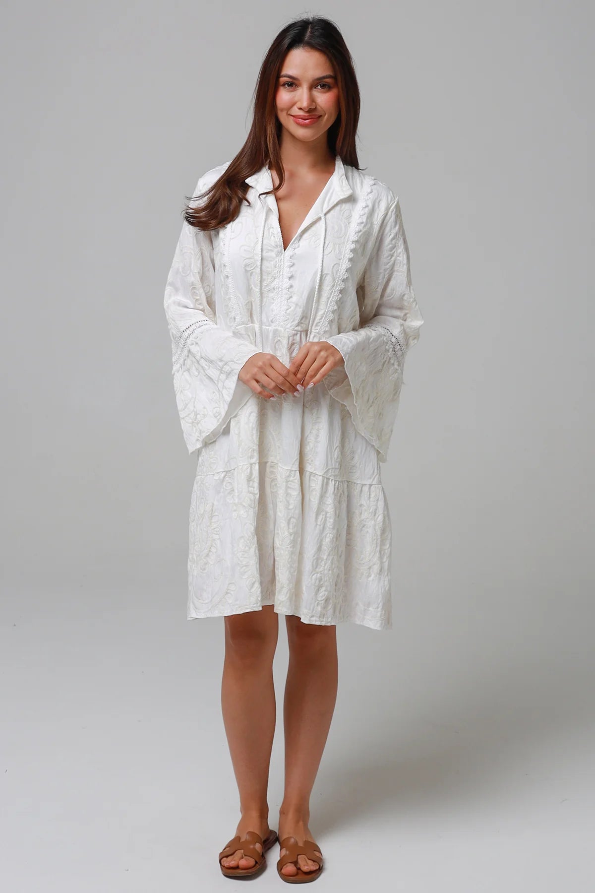 White embroidered cotton boho mini dress with lace sleeves and tassel ties - Bohemian Love Runway Australia Boho.