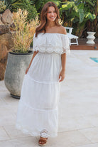 White off shoulder embroidered cotton maxi dress with lace crochet panels and tiered skirt