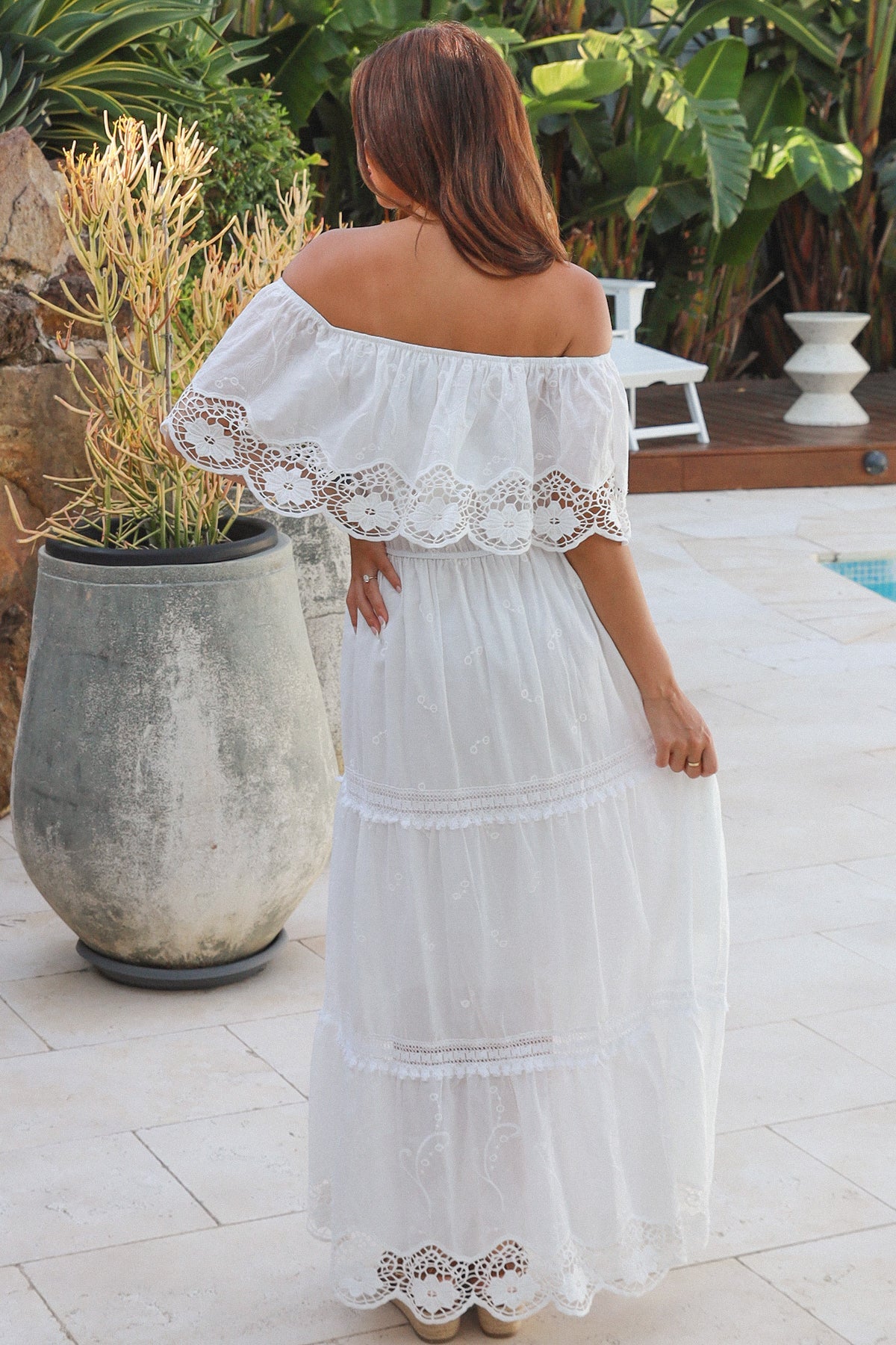 White off shoulder embroidered cotton maxi dress with lace crochet panels and tiered skirt