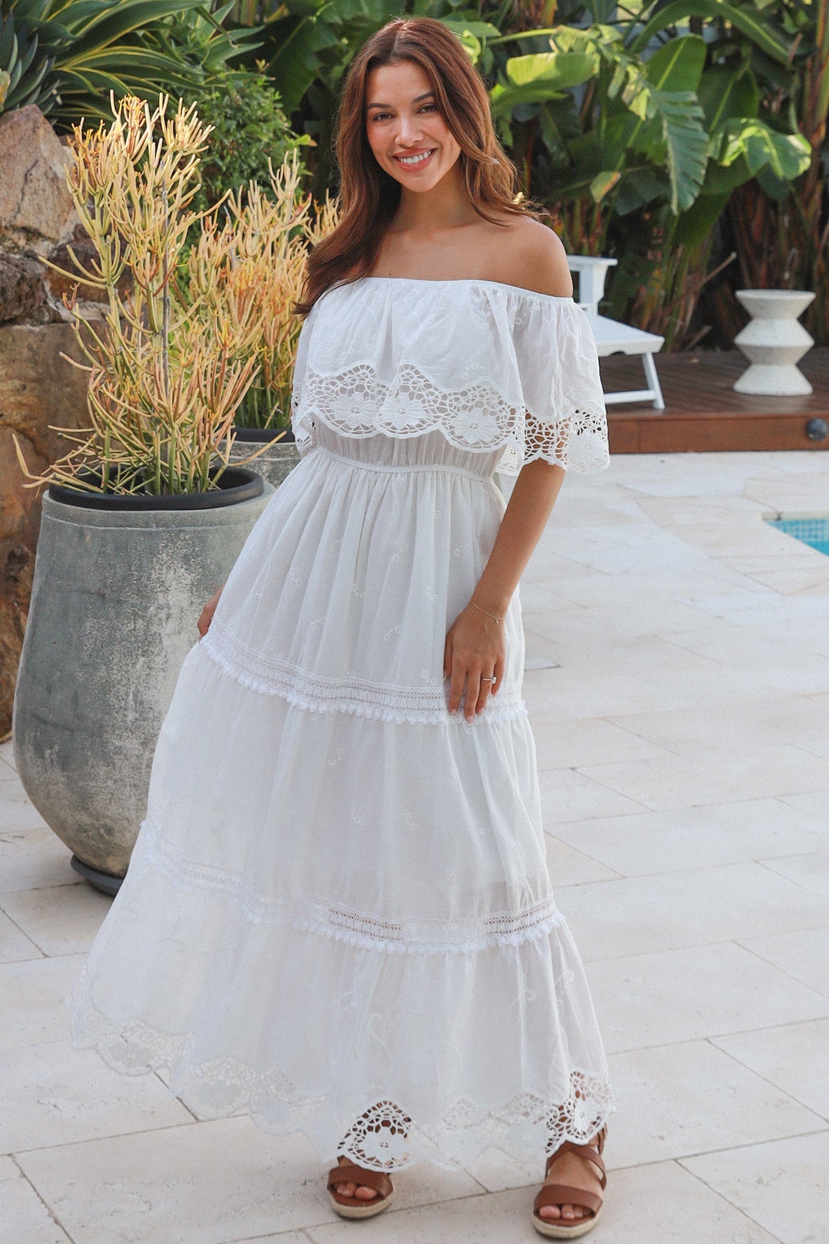 White off shoulder embroidered cotton maxi dress with lace crochet panels and tiered skirt