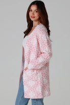 Luxury pink floral longline cardigan brushed knit with front patch pockets Charlotte the Label soft halo texture. Boho Knitwear Australia.
