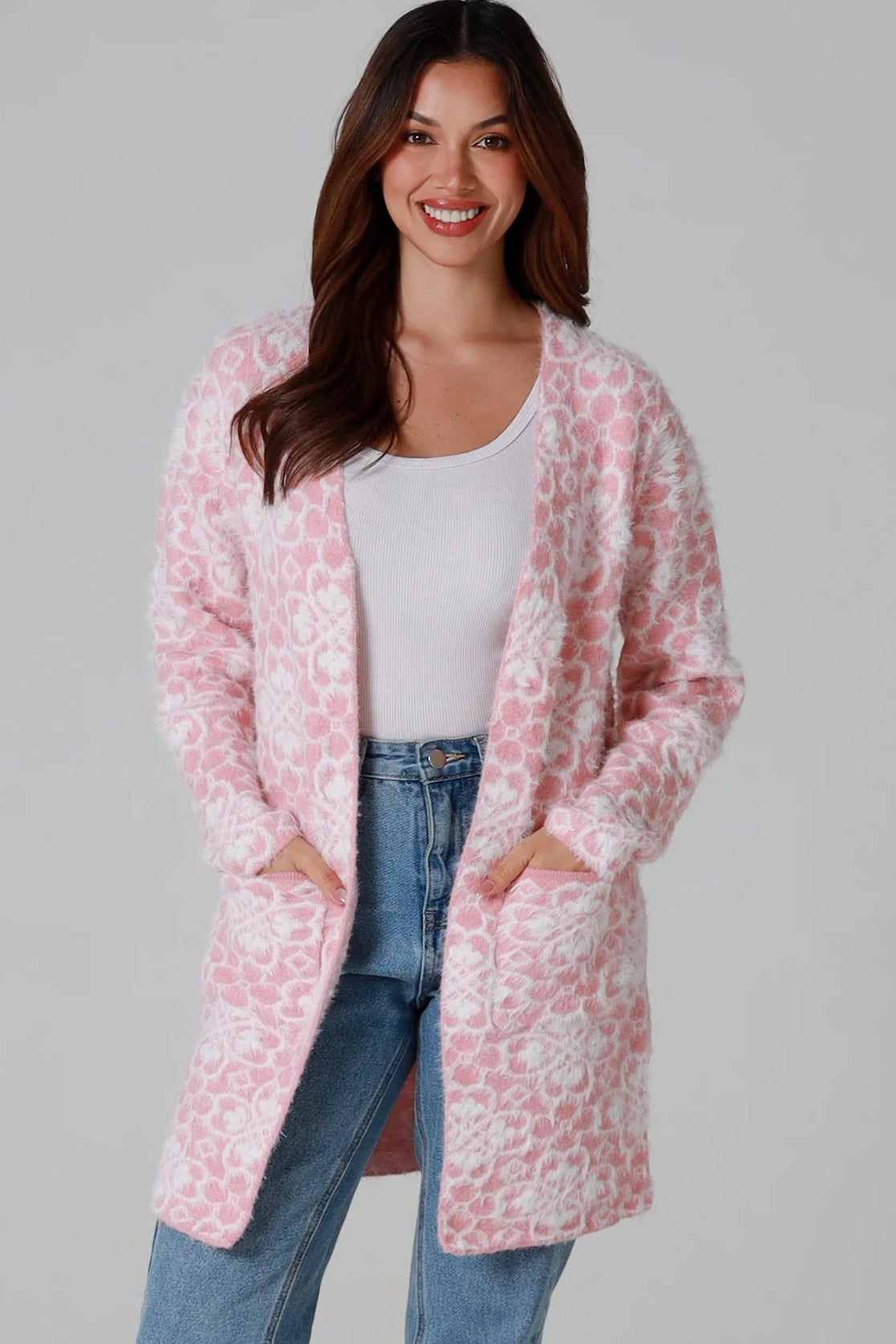Luxury pink floral longline cardigan brushed knit with front patch pockets Charlotte the Label soft halo texture. Boho Knitwear Australia.