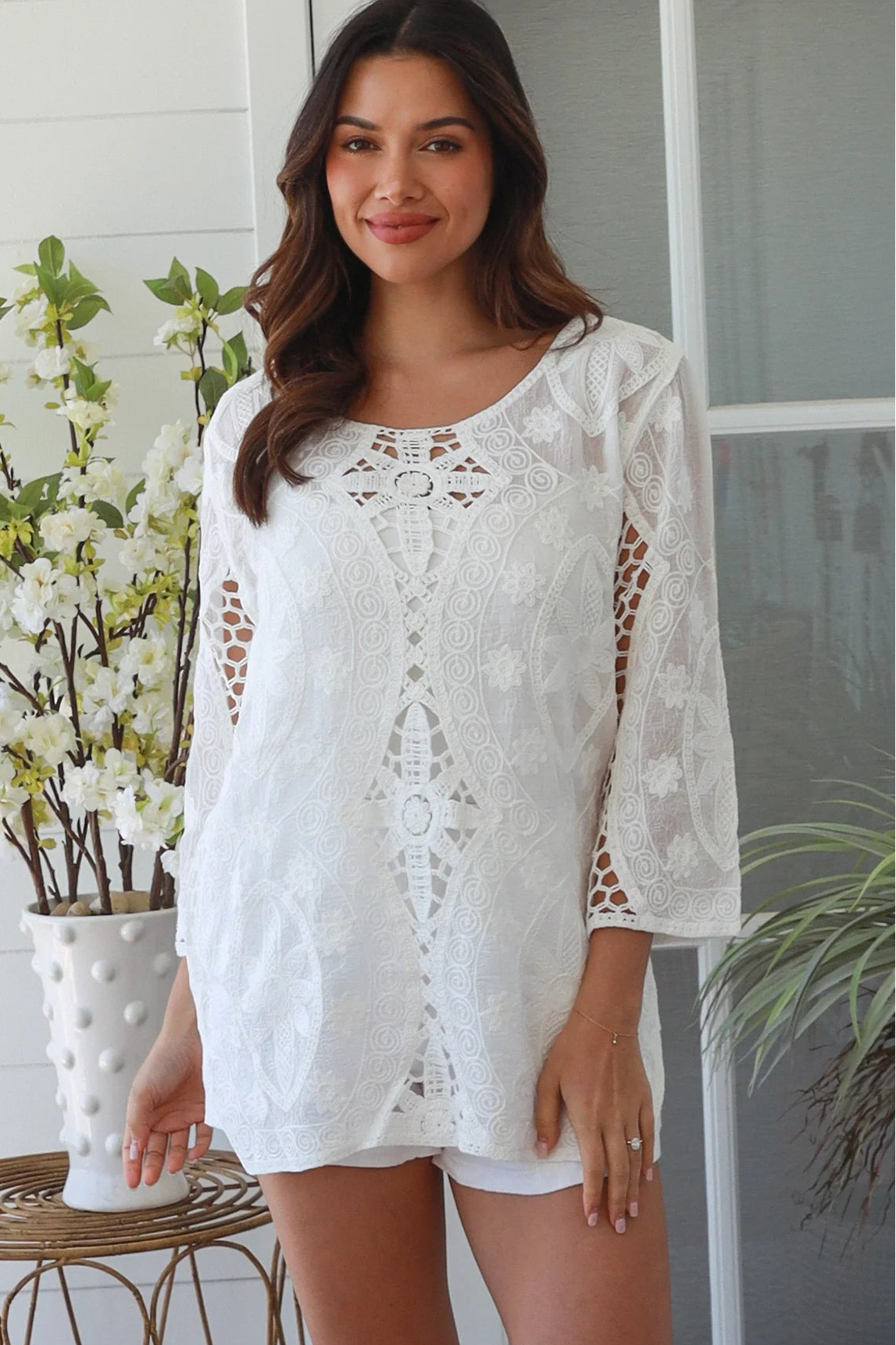 White embroidered cotton boho top with crochet detailing and three quarter sleeves relaxed Australian bohemian style