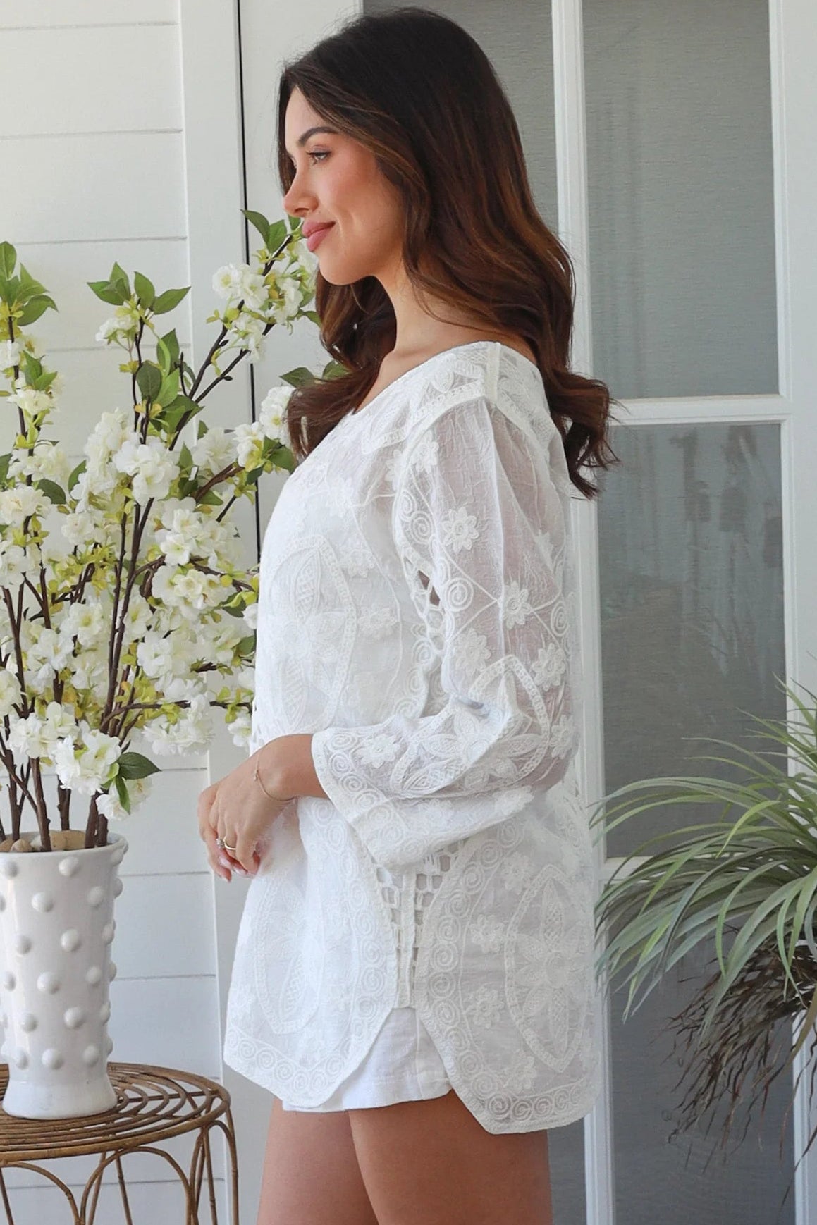 White embroidered cotton boho top with crochet detailing and three quarter sleeves relaxed Australian bohemian style