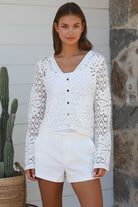 White crochet cardigan with floral blossom pattern soft vegan cotton breathable summer boho wardrobe essential — Willow Label
