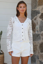 White crochet cardigan with floral blossom pattern soft vegan cotton breathable summer boho wardrobe essential — Willow Label
