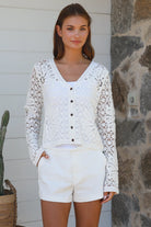 White crochet cardigan with floral blossom pattern soft vegan cotton breathable summer boho wardrobe essential — Willow Label