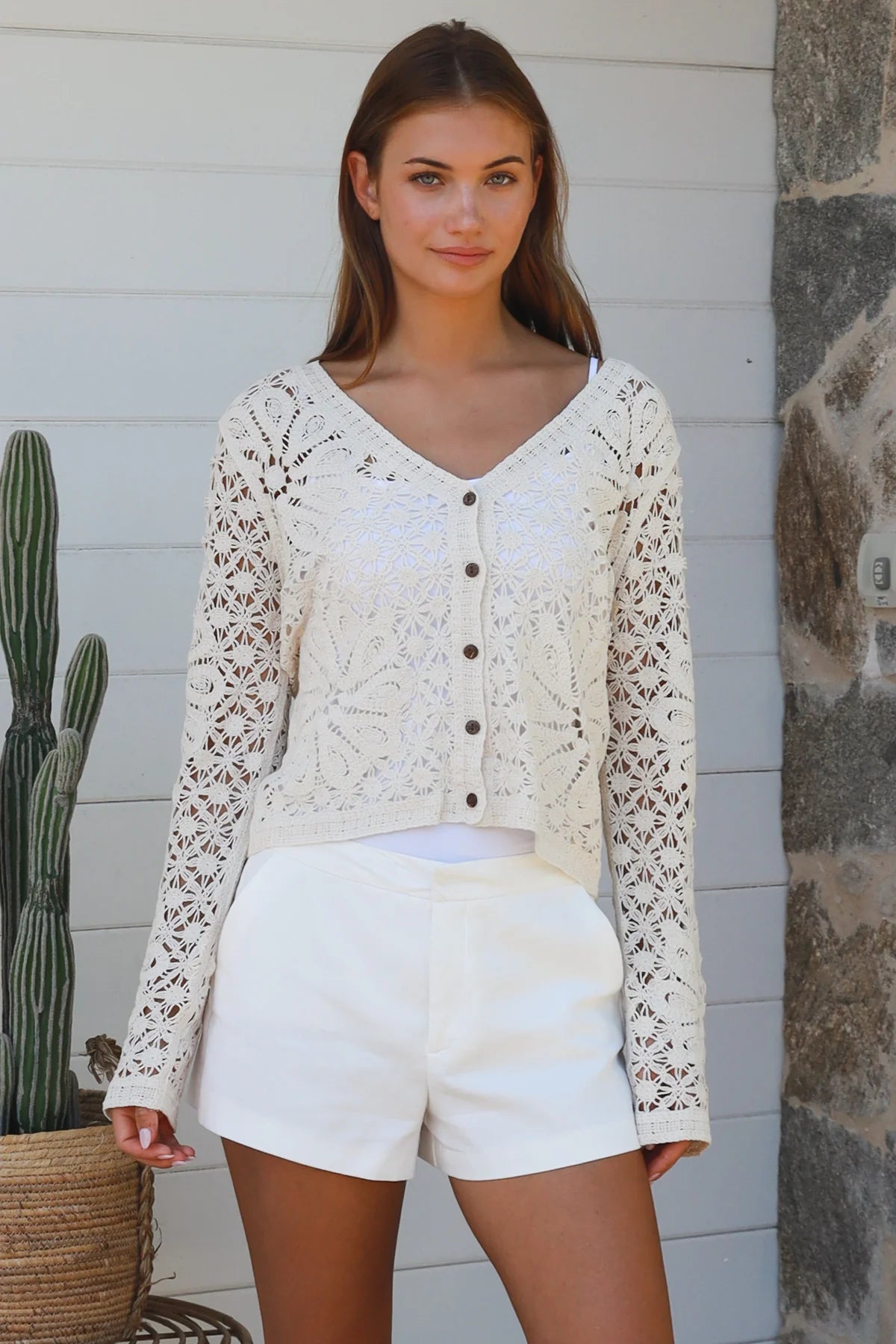 Cream floral crochet cardigan with scalloped sleeves and button-front V-neck styling — boho knitwear Australia