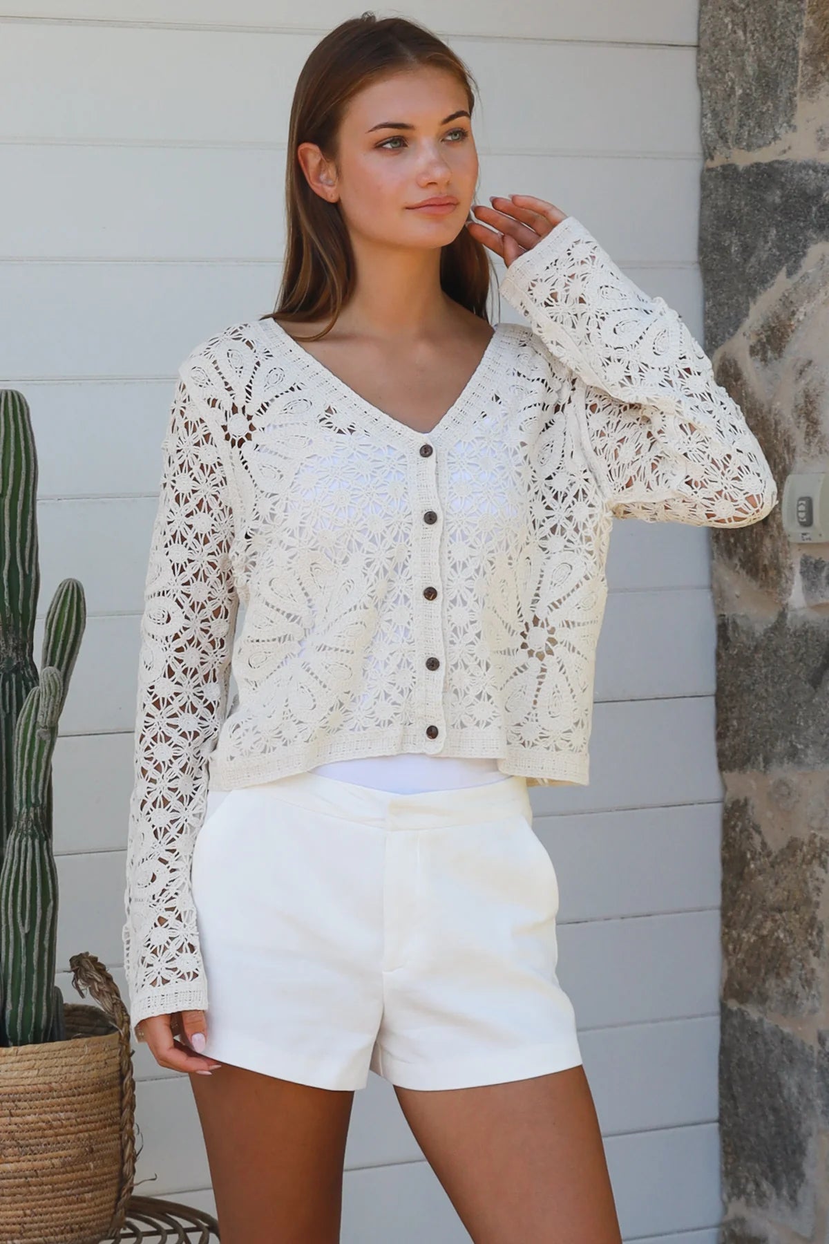 Cream floral crochet cardigan with scalloped sleeves and button-front V-neck styling — boho knitwear Australia