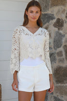 Cream crochet cotton cardigan with scalloped hem and flared sleeves by Willow the Label, women’s boho cardigan