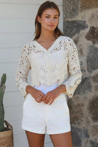 Cream crochet cotton cardigan with scalloped hem and flared sleeves by Willow the Label, women’s boho cardigan