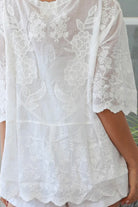 White cotton embroidered blouse with V-neck and scalloped edges – women’s tops Australia summer style