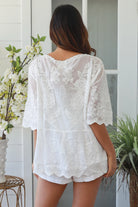 White cotton embroidered blouse with V-neck and scalloped edges – women’s tops Australia summer style