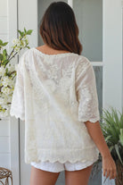 Madison embroidered cotton blouse cream with floral embroidery scalloped sleeves v-neck breathable bohemian top