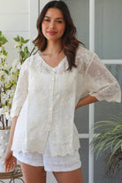 Madison embroidered cotton blouse cream with floral embroidery scalloped sleeves v-neck breathable bohemian top