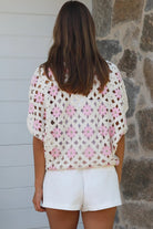 Cream + pink cotton crochet boho top with daisy squares — relaxed summer layering piece Australia.