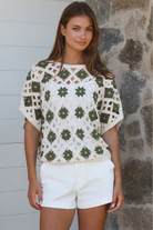 Khaki cotton crochet top with floral detail styled for modern boho elegance — Willow The Label at Bohemian Love Runway