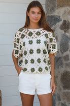 Khaki cotton crochet top with floral detail styled for modern boho elegance — Willow The Label at Bohemian Love Runway