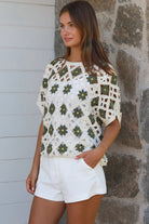 Khaki cotton crochet top with floral detail styled for modern boho elegance — Willow The Label at Bohemian Love Runway