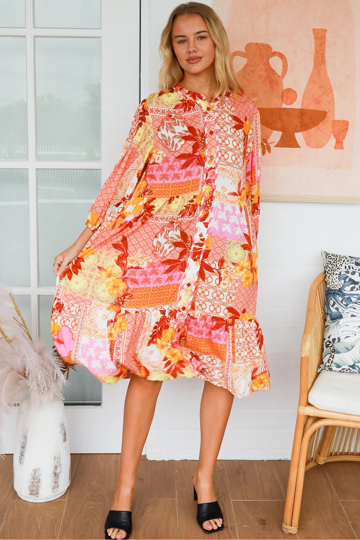 Jacqueline Floral Midi Dress by Salty Palm in coral pink patchwork floral print with split neckline and self-tie sash