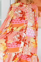 Jacqueline Floral Midi Dress by Salty Palm in coral pink patchwork floral print with split neckline and self-tie sash