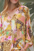 Vera Blouse in rayon with patchwork animal and floral print, V-neckline, blouson sleeves and lace shoulder detailing